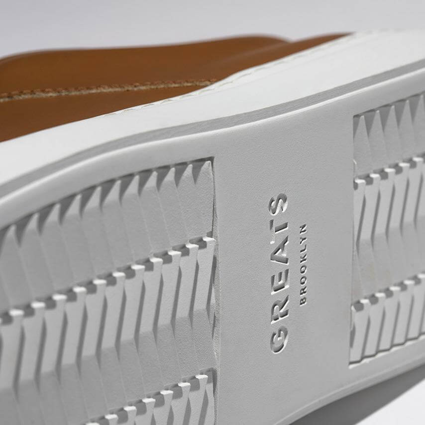 Brown sneakers with stripes