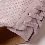 Lace-up sneakers with pink details Lace-up sneakers with pink details