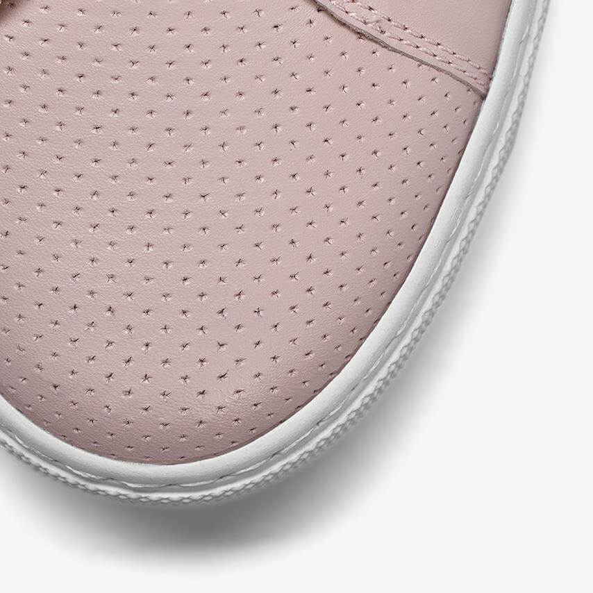 Lace-up sneakers with pink details Lace-up sneakers with pink details