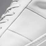 Sneakers with beige stripes