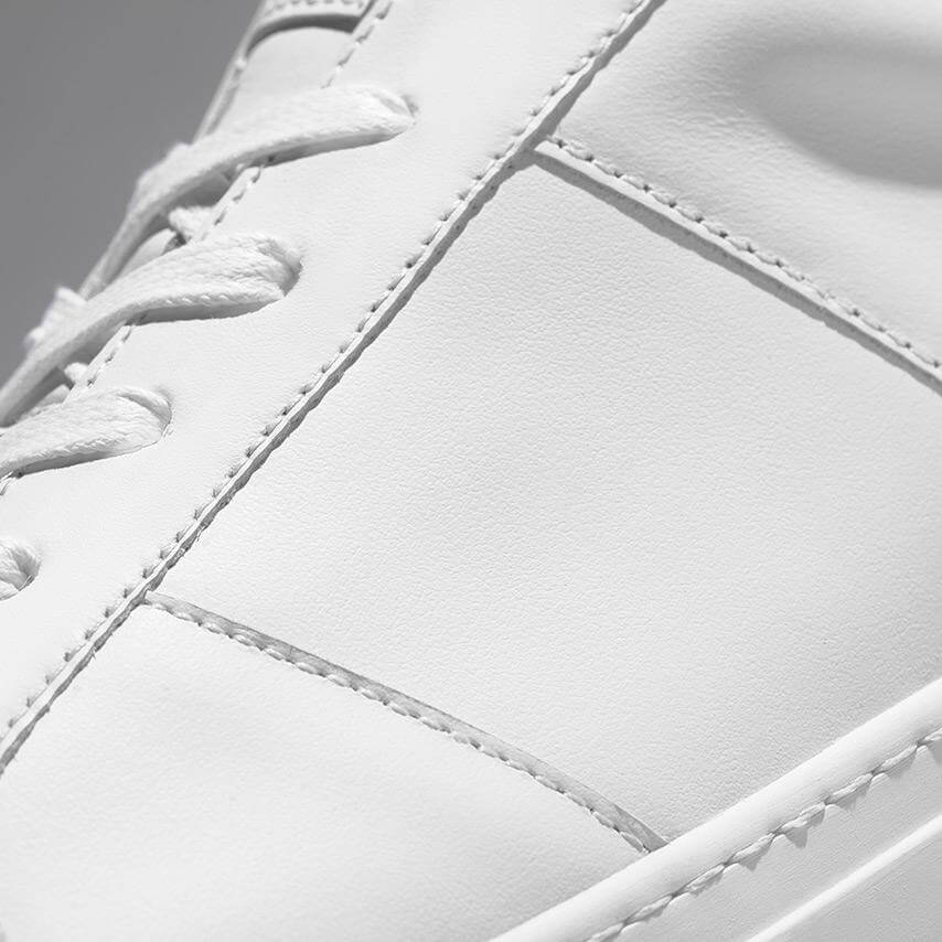 Sneakers with beige stripes