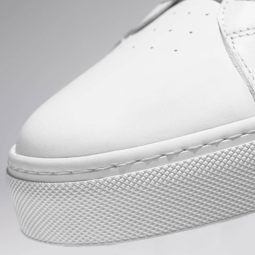 Sneakers with beige stripes